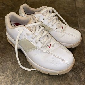 Nike beige and white golf sneakers